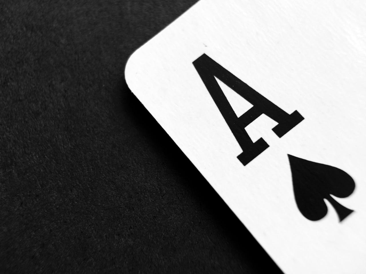 The Art of Drawing Readers In: Your attractive post title goes here Detailed view of an Ace of Spades card symbolizing luck and strategy.